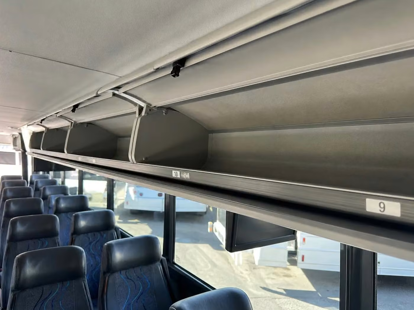lathrop 56 passenger charter bus overhead storage